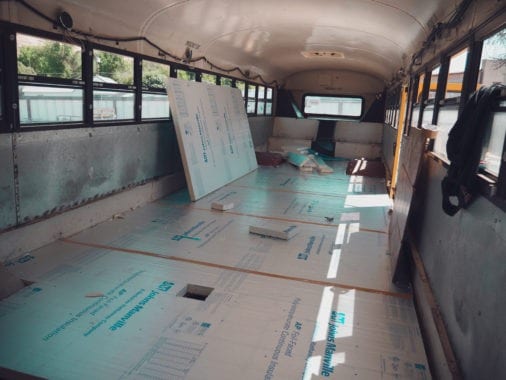 Laying floors in our skoolie was the first big project we go to do. | sincewewokeup.com | Since We Woke Up