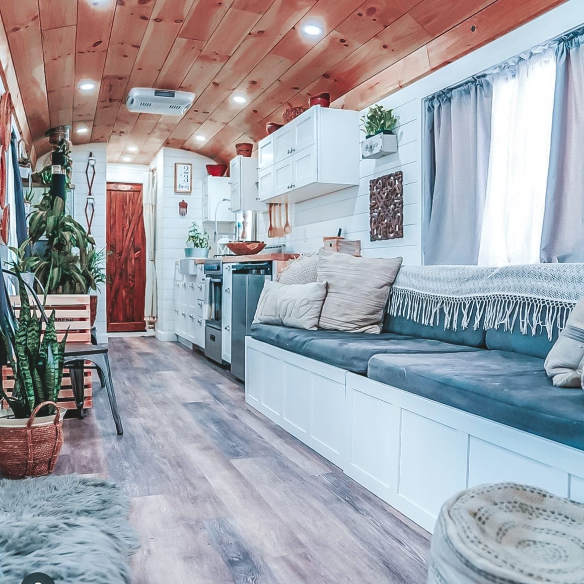 Today we're featuring the Happy Homebodies skoolie - a bus conversion with a roof raise, open floor plan and serious style! | Since We Woke Up | sincewewokeup.com