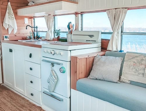Today we're featuring the Fern the bus skoolie - a bus conversion with a bright, sunshine-filled interior and cool mint exterior! | Since We Woke Up | sincewewokeup.com
