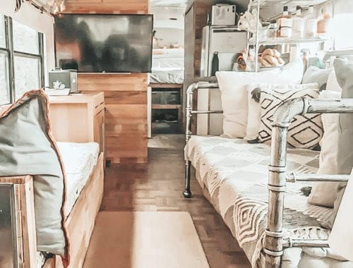 Today we're featuring the Real Buslife of Cheshire, a skoolie named Otto with a full kitchen, parquet floors, and a hanging table! | Since We Woke Up | sincewewokeup.com