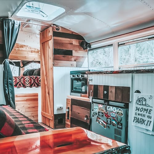 Today we're featuring the Skooliana skoolie - a bus conversion with major rustic vibes, an outdoor shower, and a recording studio! | Since We Woke Up | www.sincewewokeup.com
